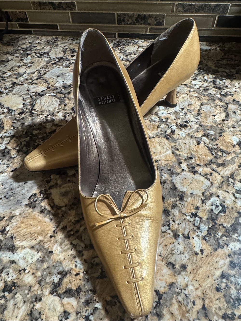 Stuart Weitzman Metallic Gold Pointed Toe Kitten Heels with Bow